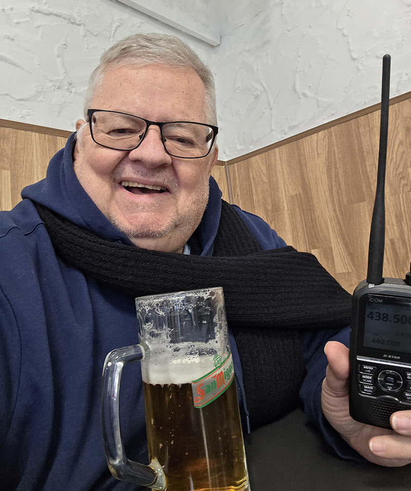 Dave with Handheld and beer